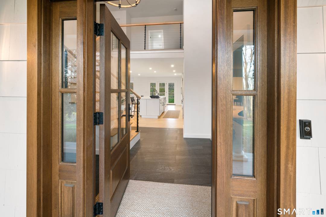 Experience the best of both worlds in Easton, where luxury, comfort, and timeless elegance meet unmatched privacy, just minutes from the vibrant downtowns of Westport and Fairfield.