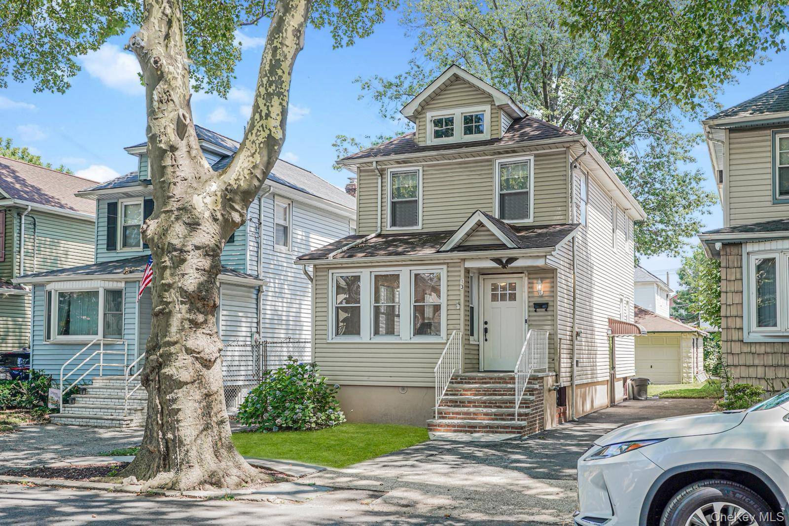 Welcome to this beautifully maintained Colonial nestled in the heart of Westerleigh.