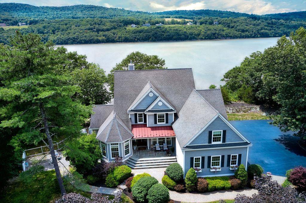 Welcome Home ! Experience sweeping Hudson River views throughout this exceptional home, where breathtaking water vistas offer a truly unique living experience.