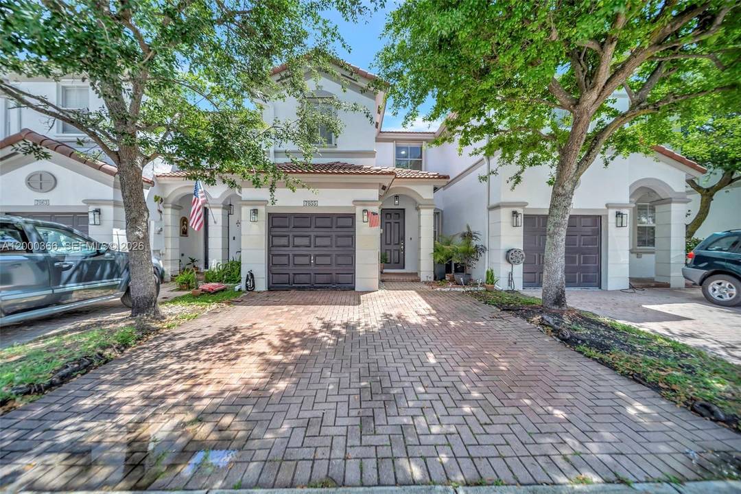 Beautiful and well maintained townhome with 3 bedrooms with 3 full bathrooms and a converted garage that can be used as a 4th bedroom or office.