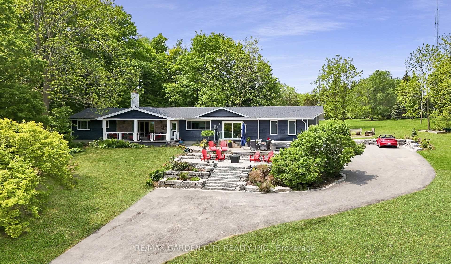 HILLSIDE HAVEN ON NEARLY 2 ACRES !