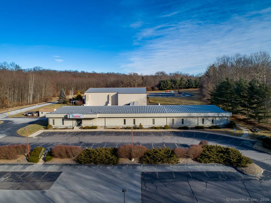 Exceptional investment opportunity at 303 Merrow Road, Tolland, CT.