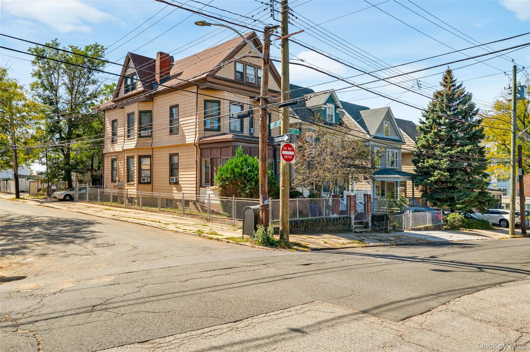 Welcome to 40 Point Street a fully occupied three family property perfectly positioned near the Yonkers waterfront.