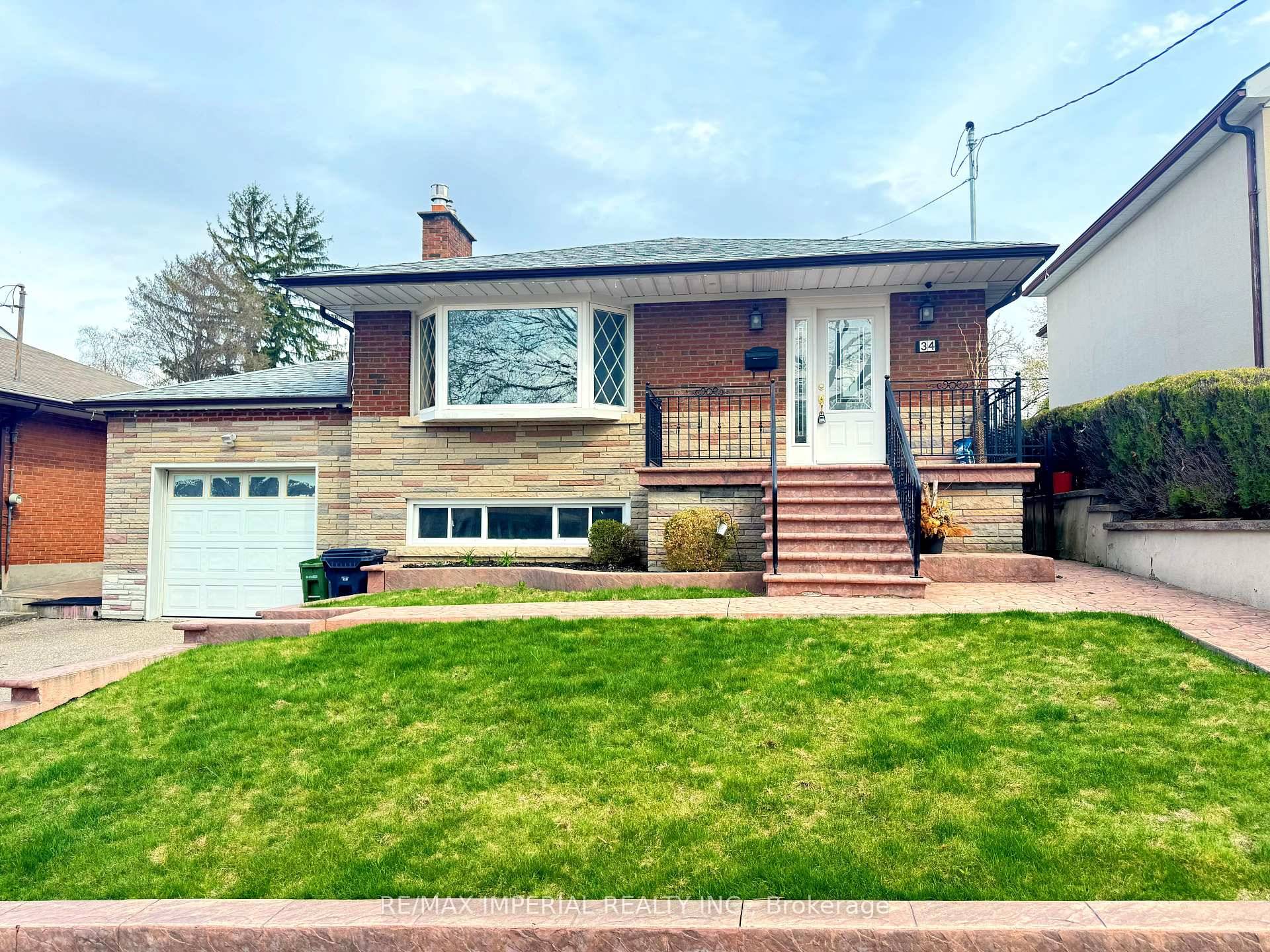 Beautiful brick and stone bungalow located in the highly desirable South Sunnylea neighborhood !