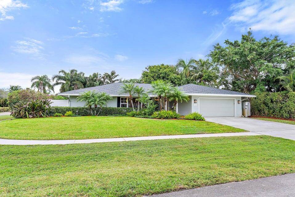 Discover this stunning 3 bedroom, 2 bath home perfectly situated on an oversized, beautifully landscaped corner lot with custom lighting.