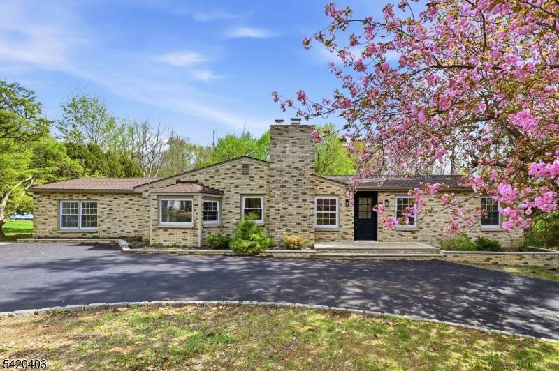 Brick Ranch Home on a level 2 acre lot, with large deck, newer kitchen with granite, and newer appliances.