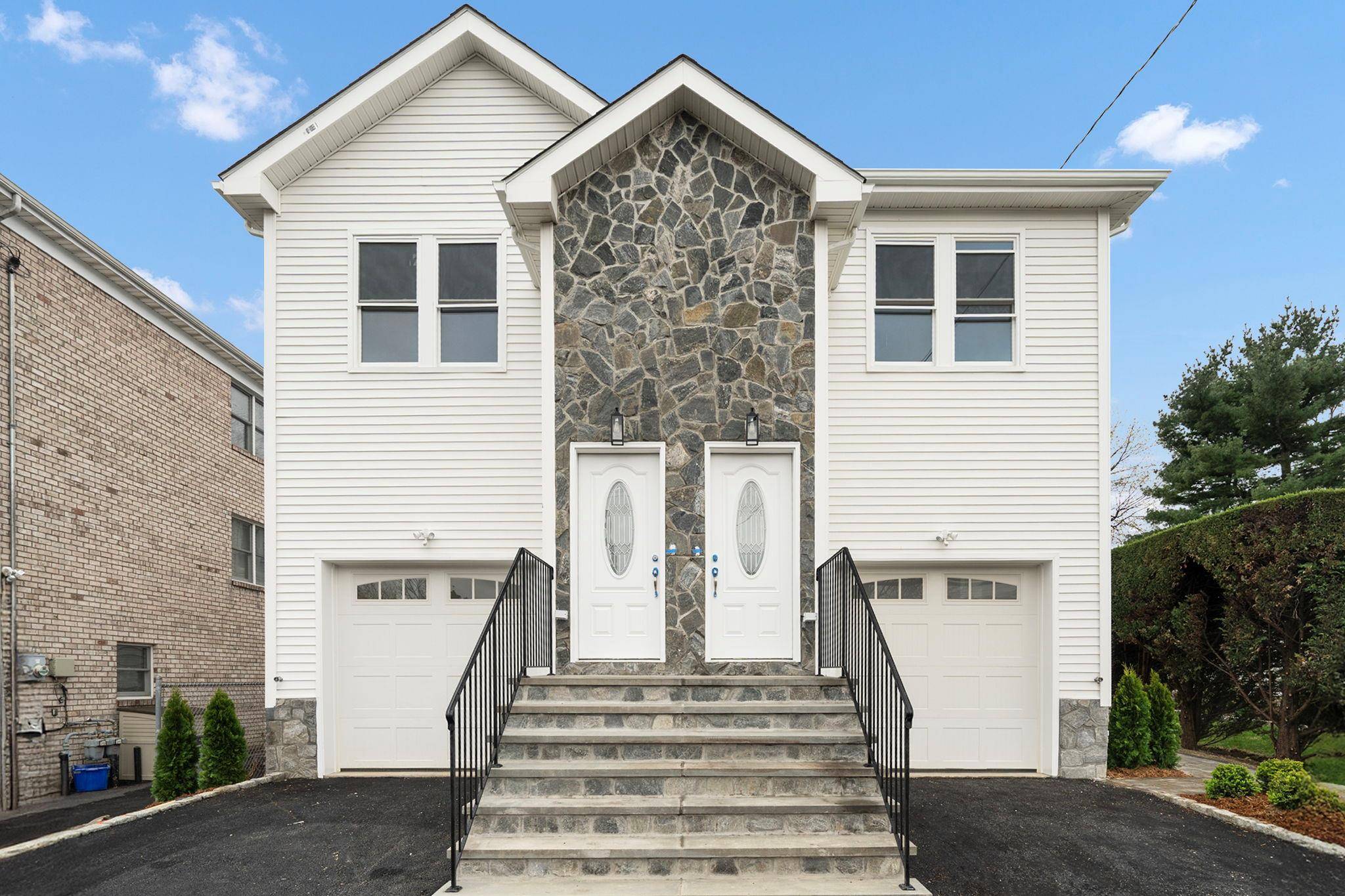 A touch of class best describes this HUGE meticulous brand new two family.