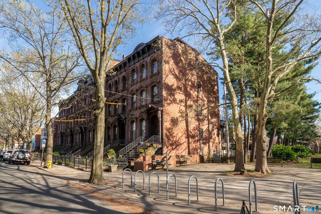 This coveted iconic end unit Brownstone is part of the National Historic Places.