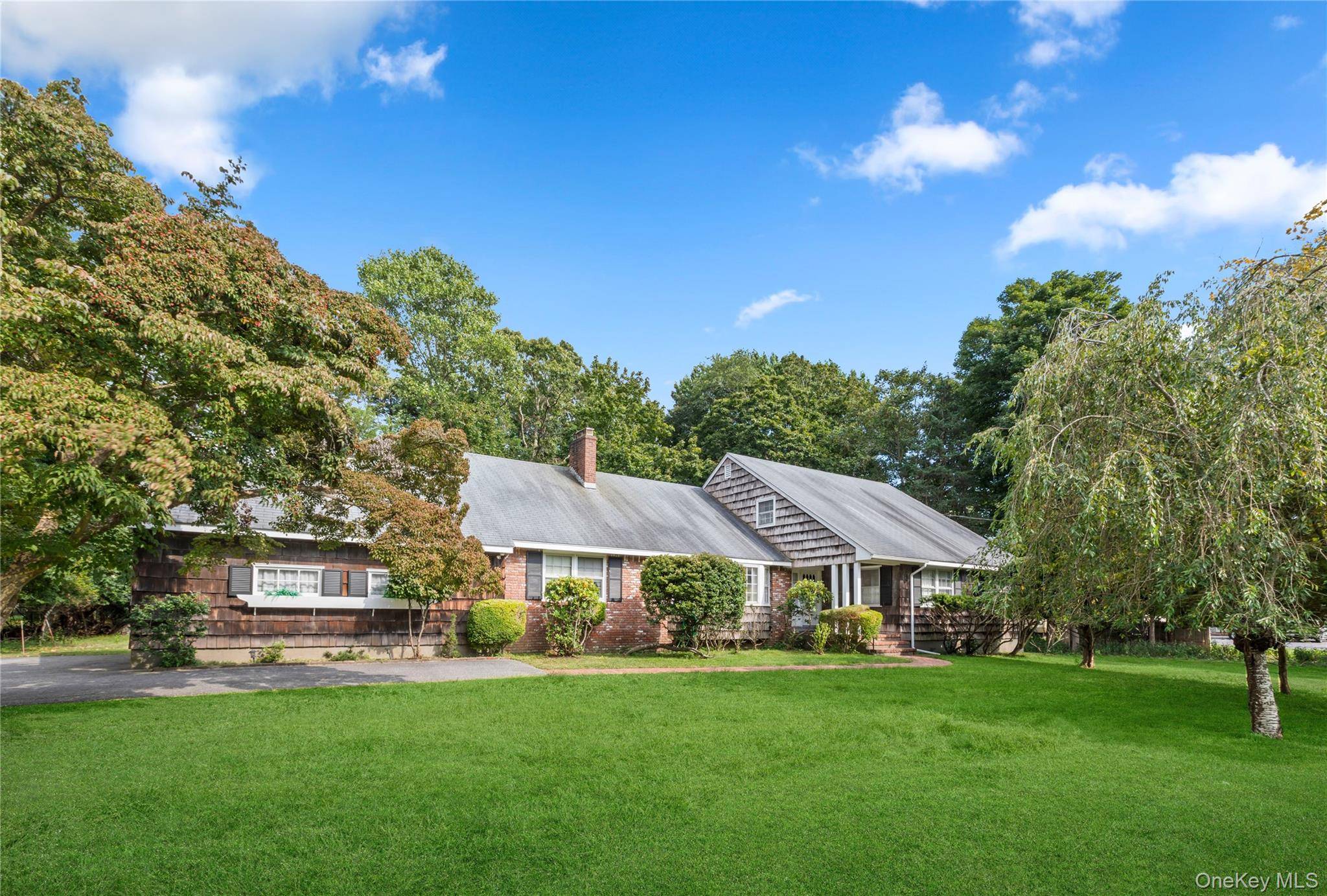 Welcome to this beautifully appointed home where timeless charm and modern potential come together.