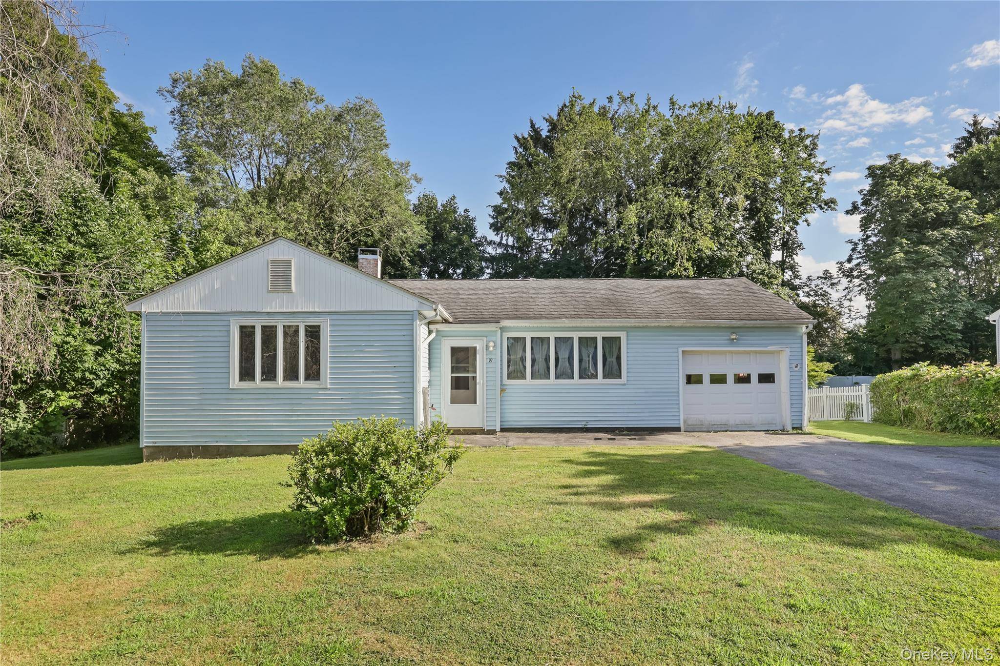 Charming Three Bedroom Ranch with Spacious Fenced Yard amp ; Endless Potential.