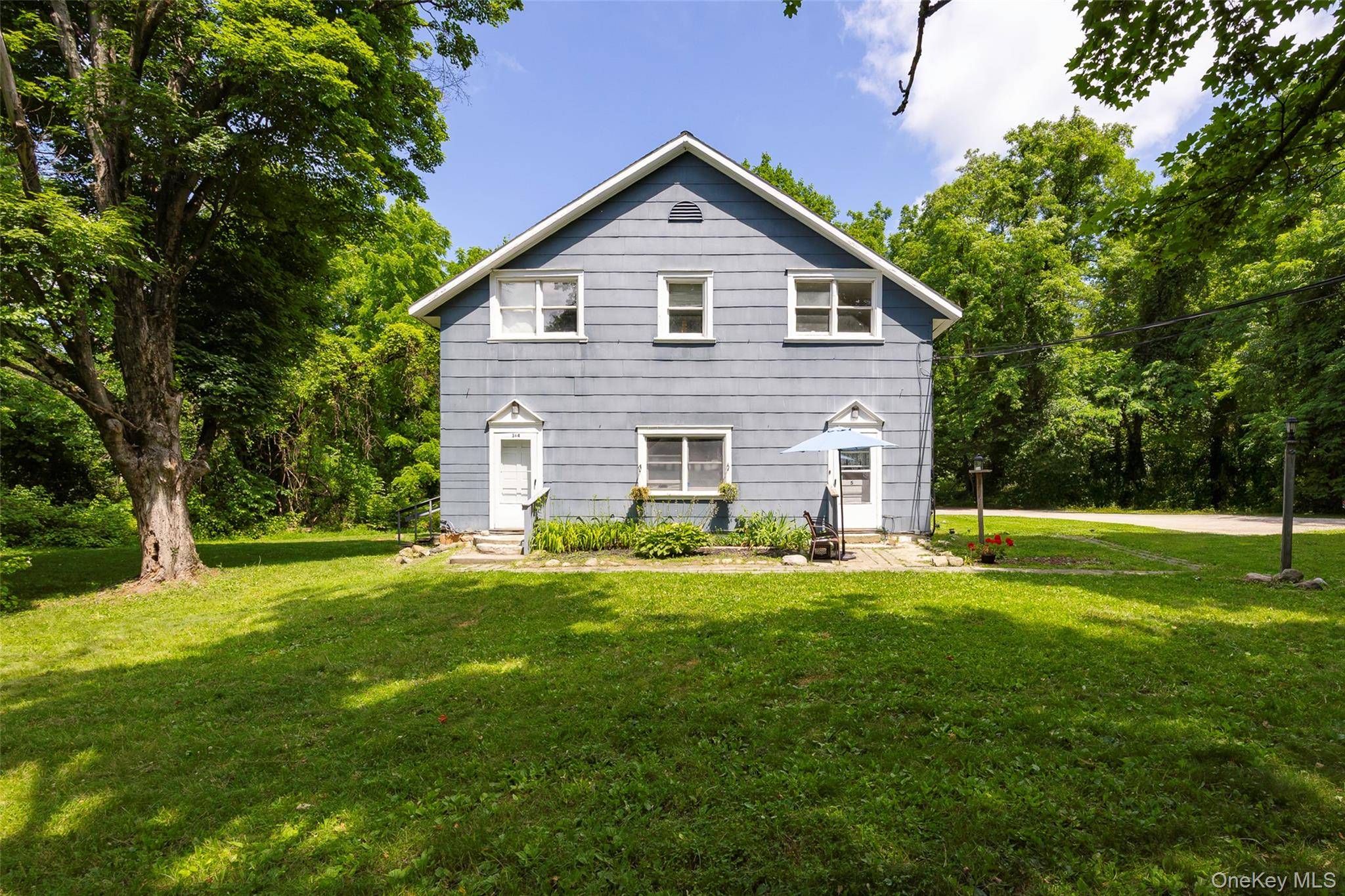 Turnkey 5 Unit Investment Opportunity in Millbrook on Over an Acre.