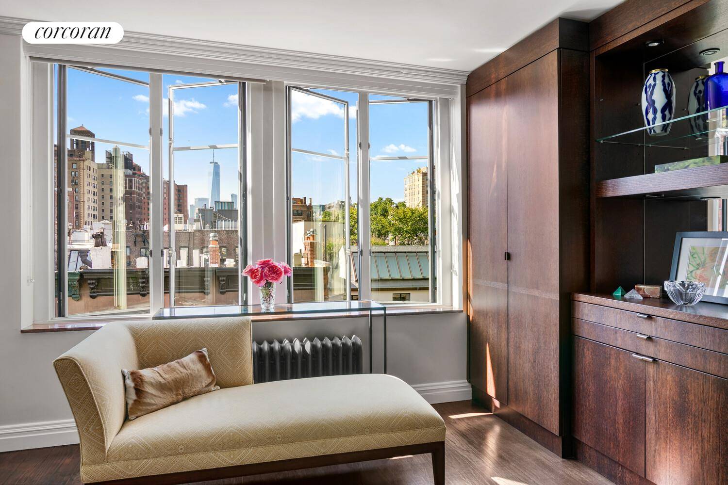 Overlooking picture perfect West 9th Street, Residence 7B is a spectacular one bedroom home with open southern views stretching downtown to One World Trade Center.