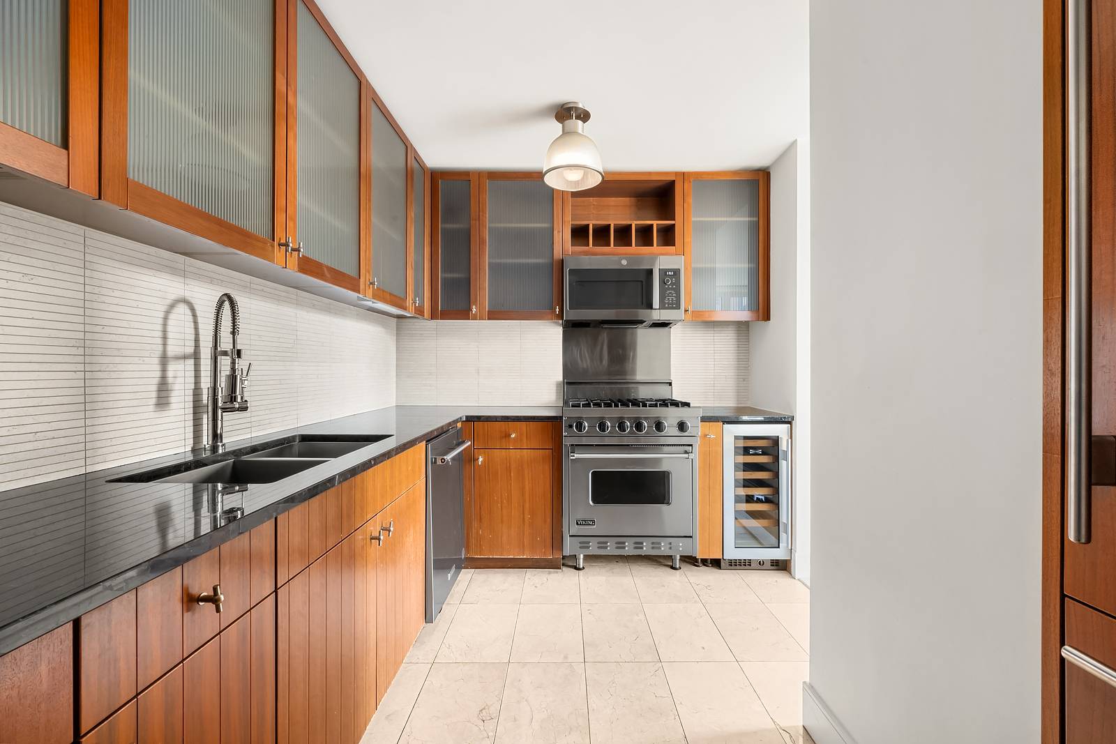 Discover this exceptional 3 bedroom apartment with a stylish powder room and abundant storage, located within the prestigious Veneto Condominium.