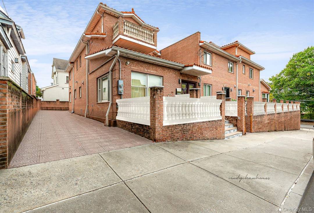 Exceptional solid brick home nestled in a desirable location of Middle Village.