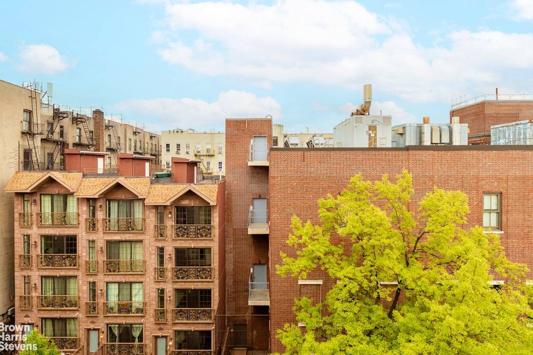 Rare Find ! ! Sun filled 4 bedroom apartment with open city views in a well managed elevator building !