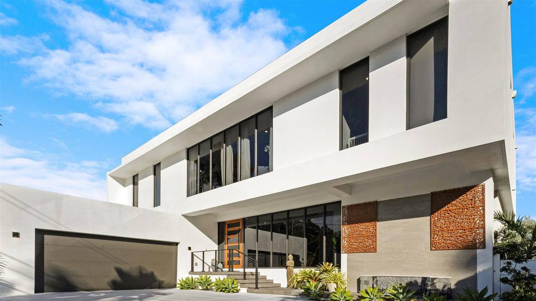 An architectural statement of modern waterfront luxury, this 2024 new construction residence sits on one of Rio Vista s most prestigious addresses.