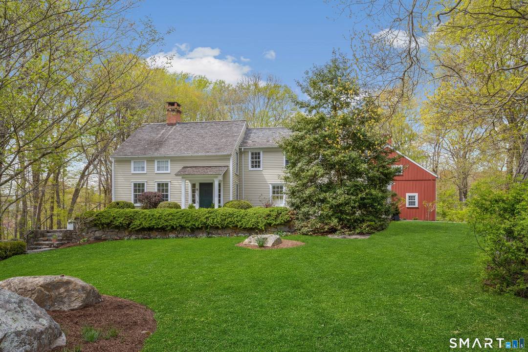 Stunning Sun Filled Colonial with Designer Barn.