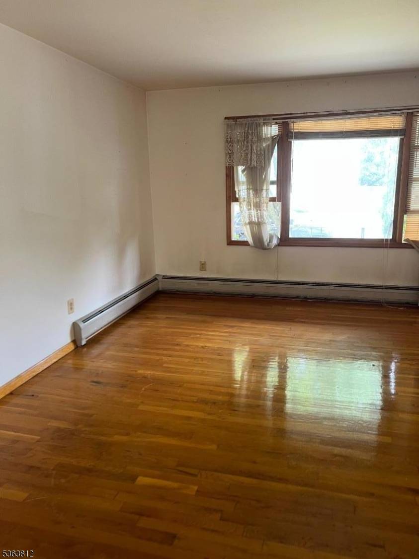 This Four 4 bedroom, 2 1 2 baths COLONIAL Style home offers a large Living Room, Dining Room, EIK, Full Basement with loads of potential.