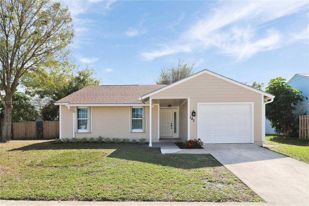 Completely Remodeled 3 Bedroom 2 Bathroom Home with a 1 Car Garage in the Heart of Jupiter !