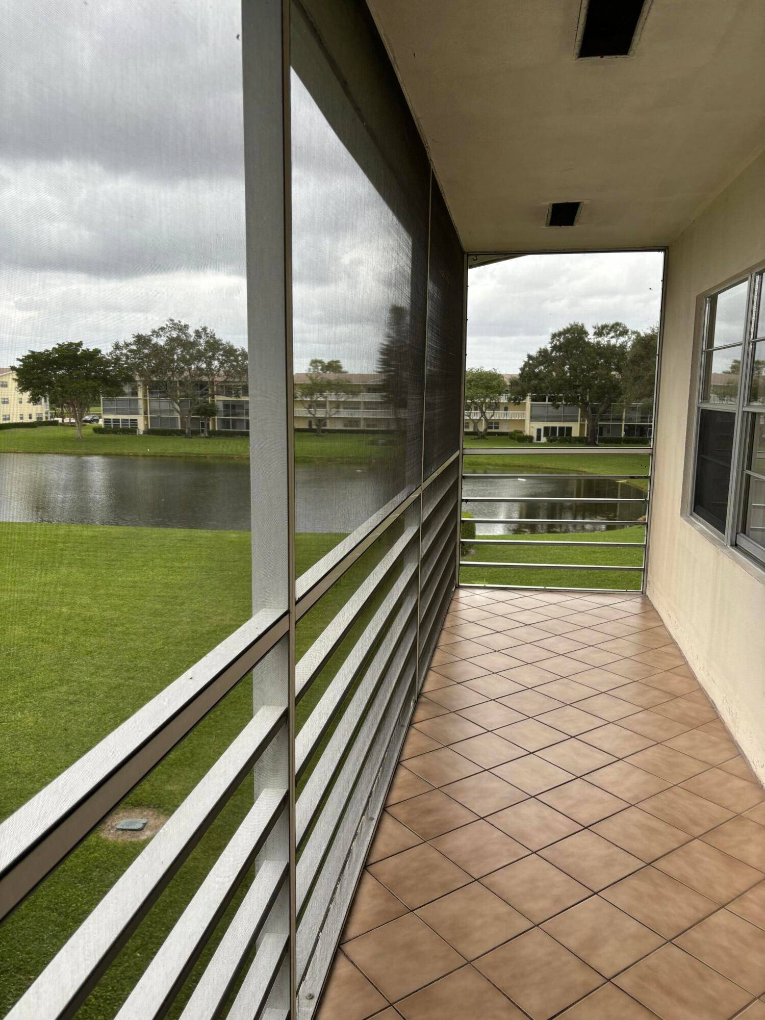 Highly desired corner unit with beautiful lake views from all rooms, including a large screened in back patio where you can enjoy sipping your morning coffee.