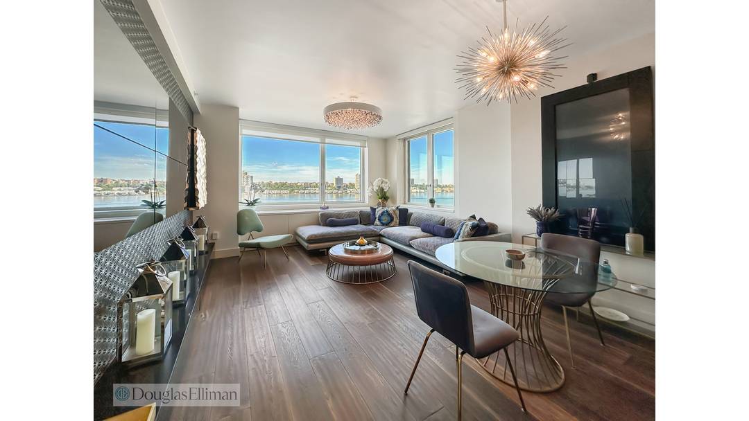 Fully Furnished and rarely available, 940square feet, luxury 1 bedroom Home Office Guest Room with magnificent views of the Hudson River at the Avery Condominium !