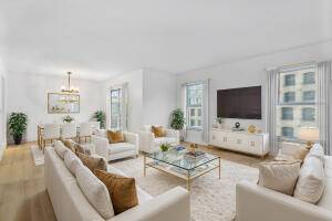 Welcome to this beautifully updated corner unit in a prime East Boca location, just steps from the beach and South Inlet Park.