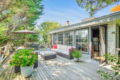 Steps from the sand this airy adorable cozy 2 Bedroom 1 Bath beach cottage in Fire Island Pines pairs classic charm with easy low maintenance living.