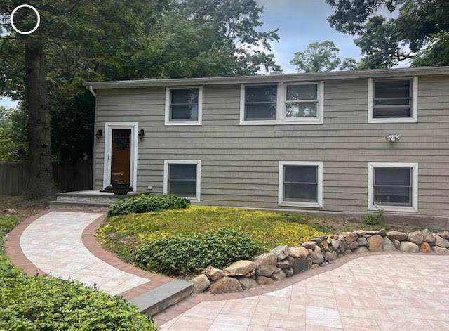 Welcome to Cul de sac Living adjacent to Setauket Greenway Trail, Nature lovers will love the direct access to the trail.