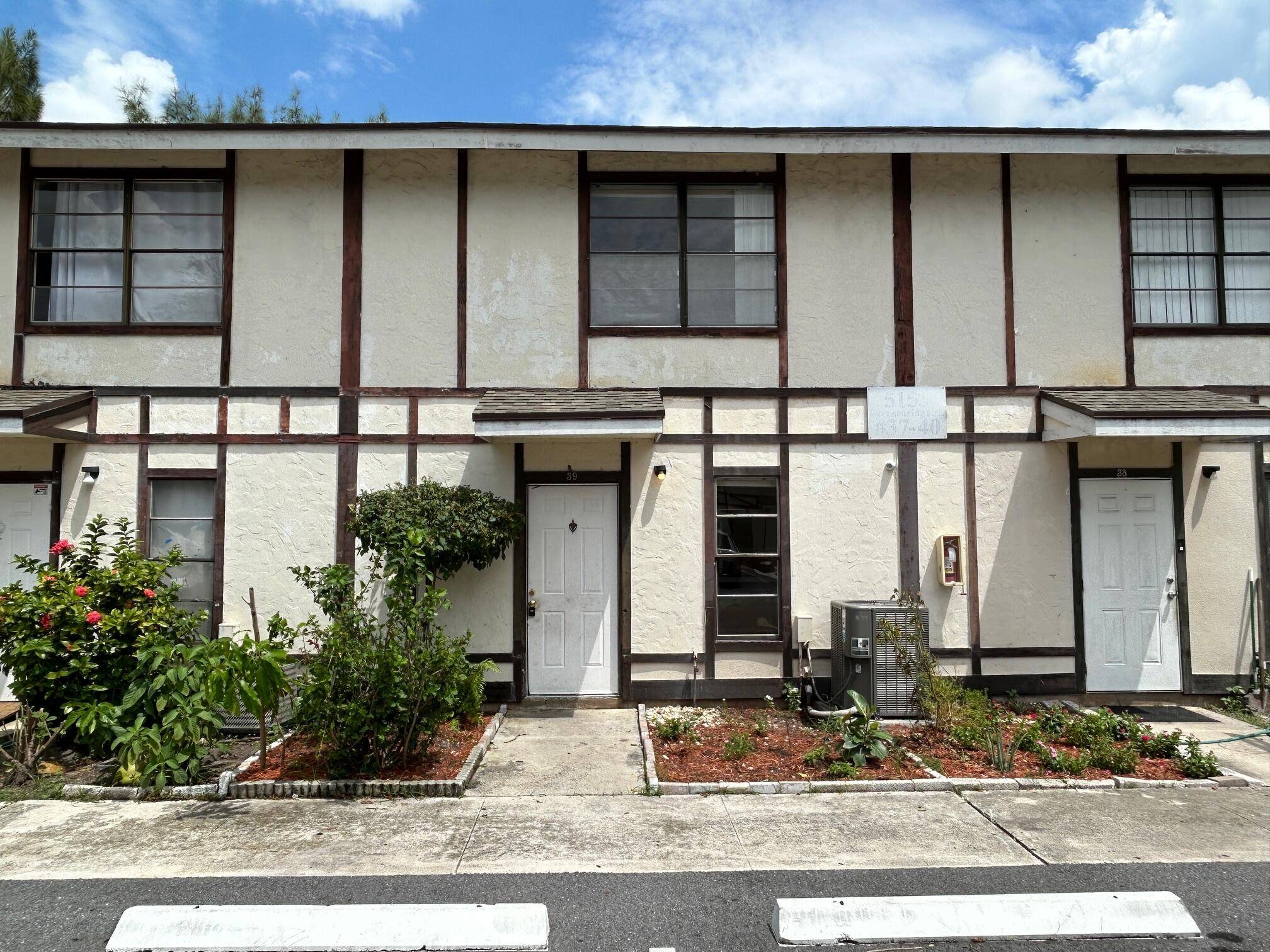 Welcome to this clean two bedroom, one and a half bathroom two floor condo located in the heart of West Palm Beach.