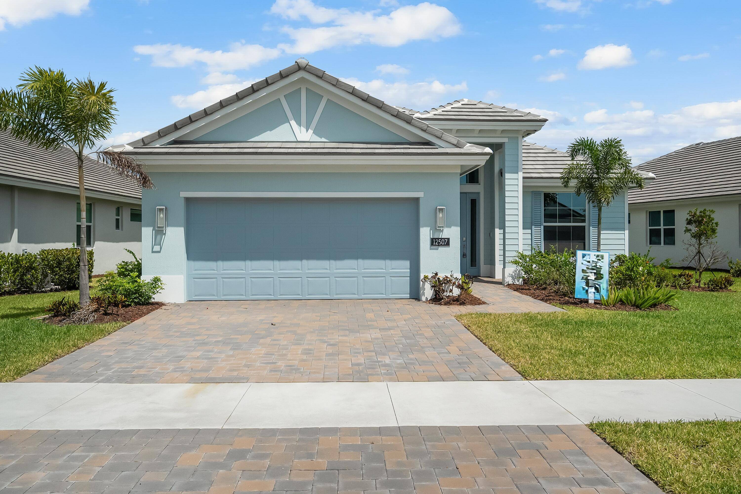 This welcoming 2 bedroom, 2 bath plus den home provides soothing colors indoors and out.