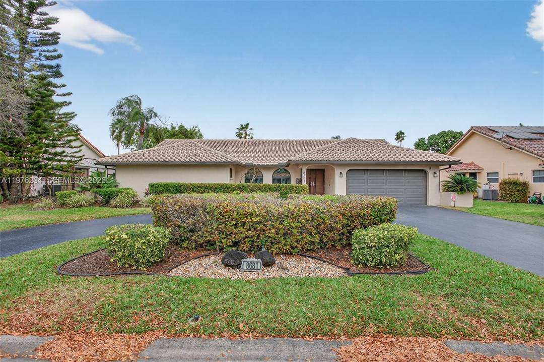 This luxurious, upgraded home in Pine Ridge is a must see, one of the nicest homes in Coral Springs.