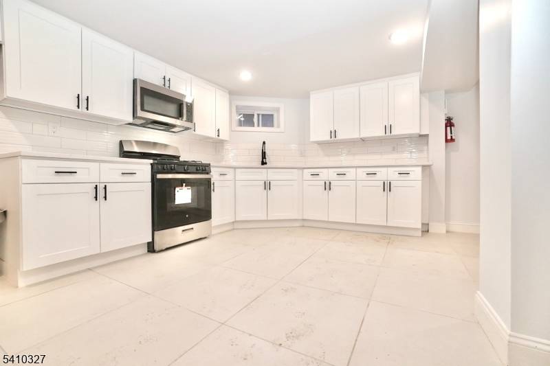 Prime 2025 newly renovated two family home in Jersey City, perfect for owner occupants or investors.