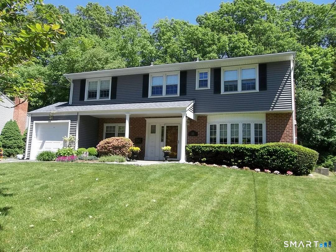 Updated colonial split level home in sought after mid Ridges.