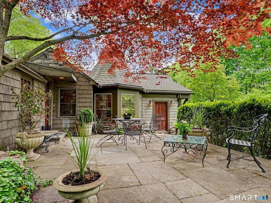 Step into the dramatic charm of this 3 bedroom, 1 1 2 bath ranch, an architectural jewel nestled in lower Weston.