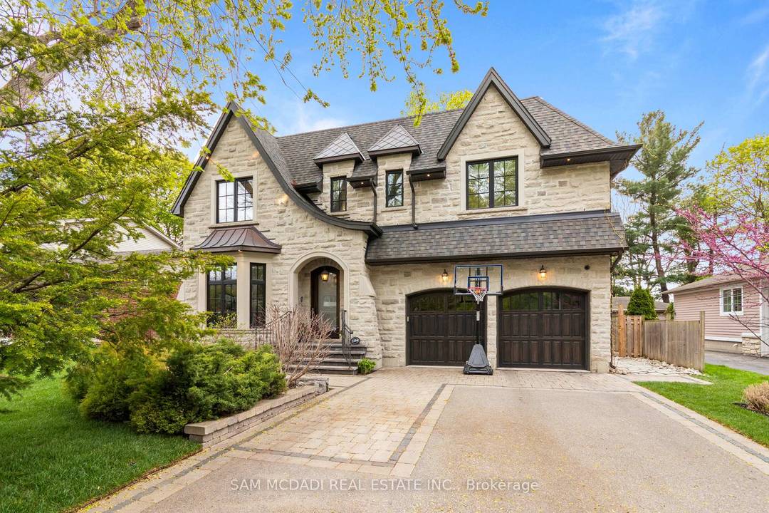 A masterpiece of architectural elegance in South Mississauga's prestigious Lorne Park Clarkson enclave, this exceptional residence offers over 5, 000 sq.