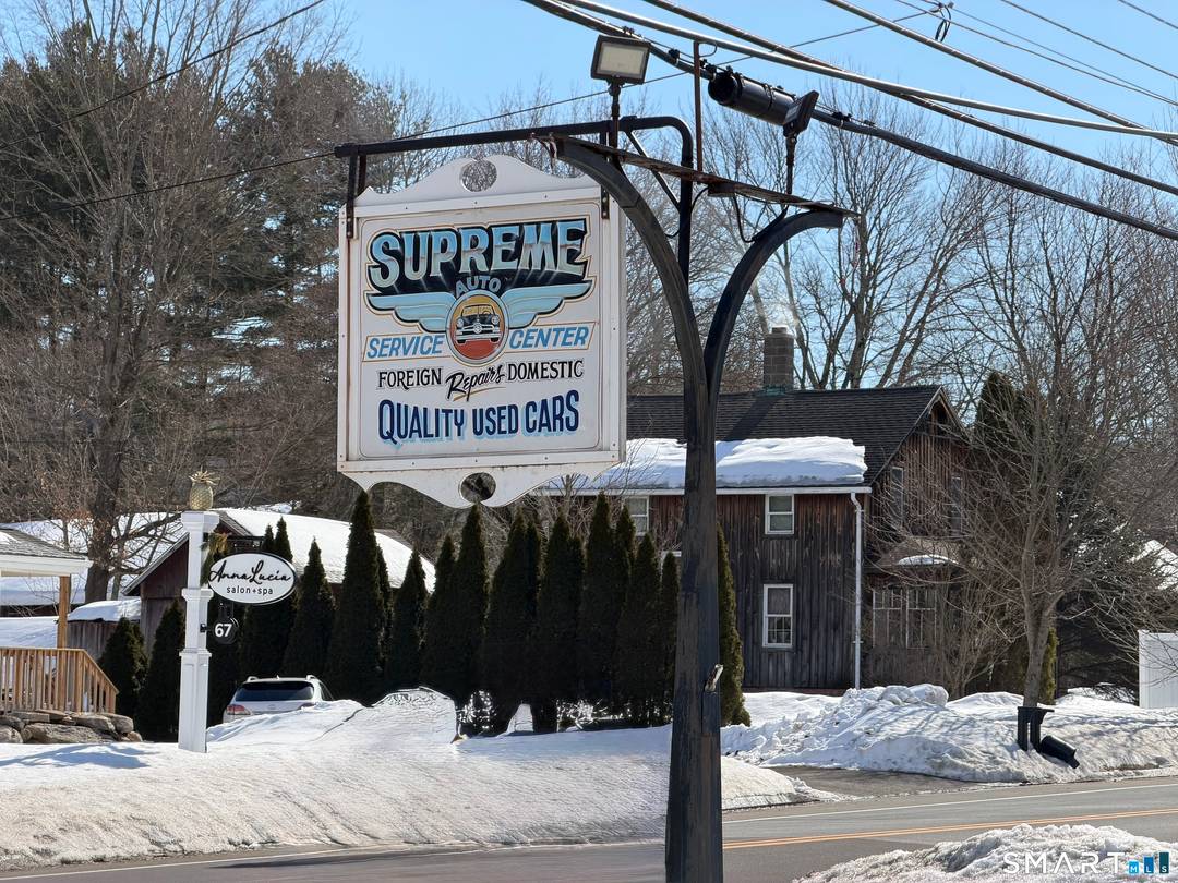 Three bay auto repair shop consisting of 2550 sq ft on.