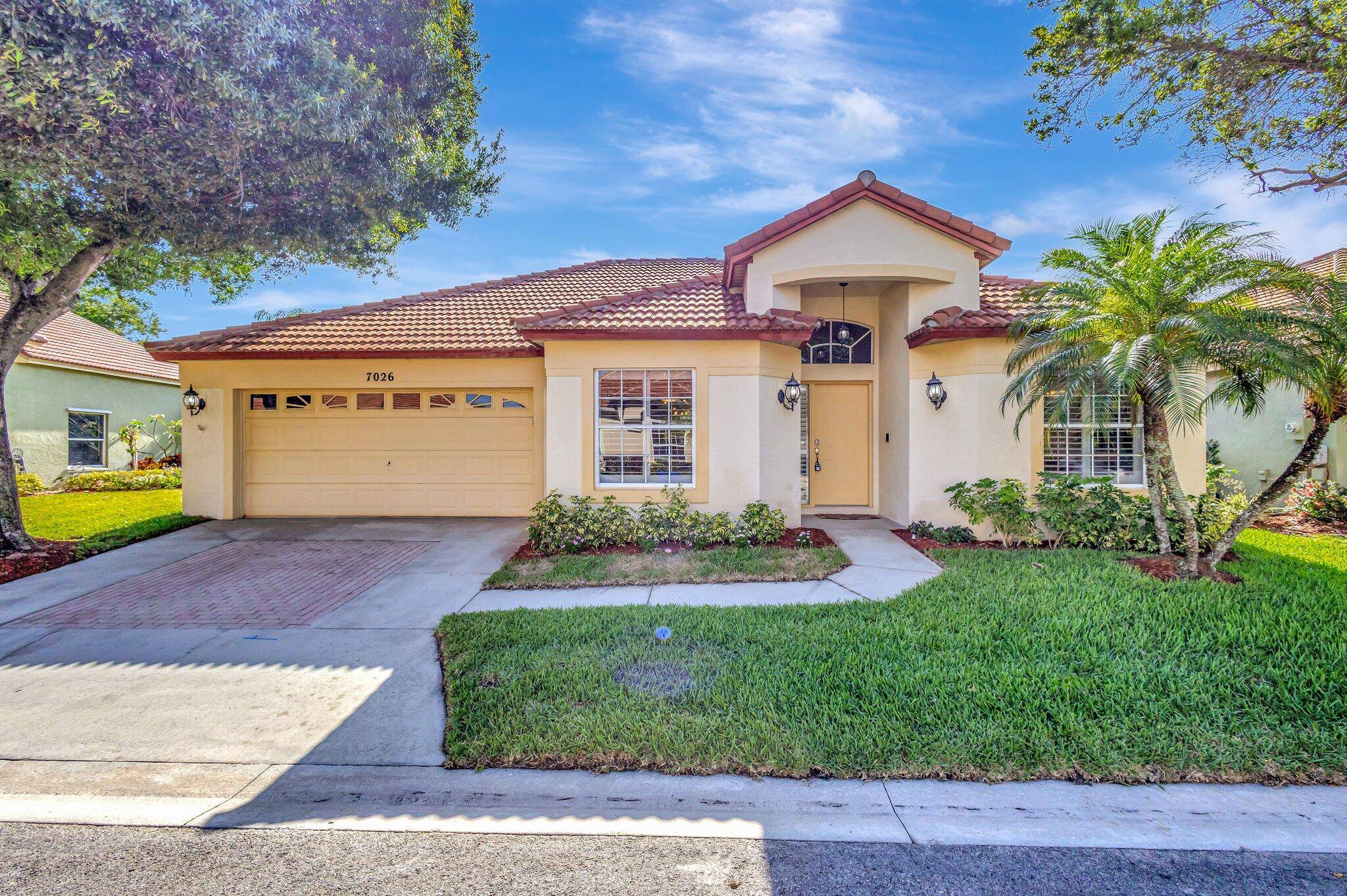 Riviera Beach, Florida ! Just picture a charming 3 bedroom 2 bath home having a screened enclosed glistening pool, overlooking an Eastern sunrise lake view from the rear patio.