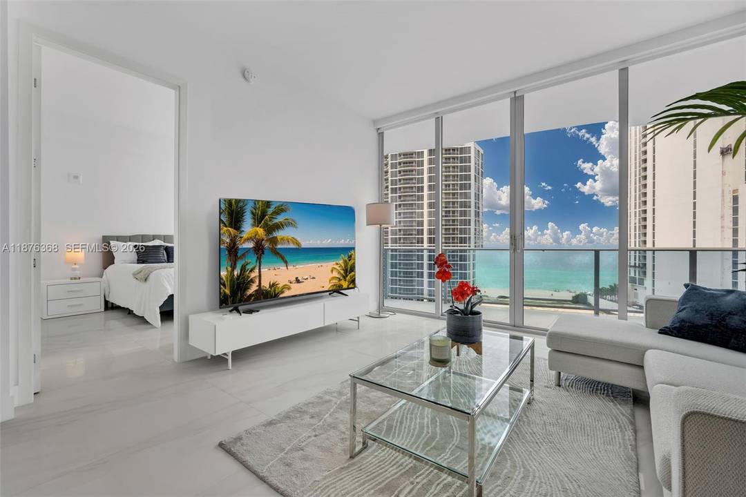 Experience breathtaking oceanfront living in this elegant 2 bedroom, 2.