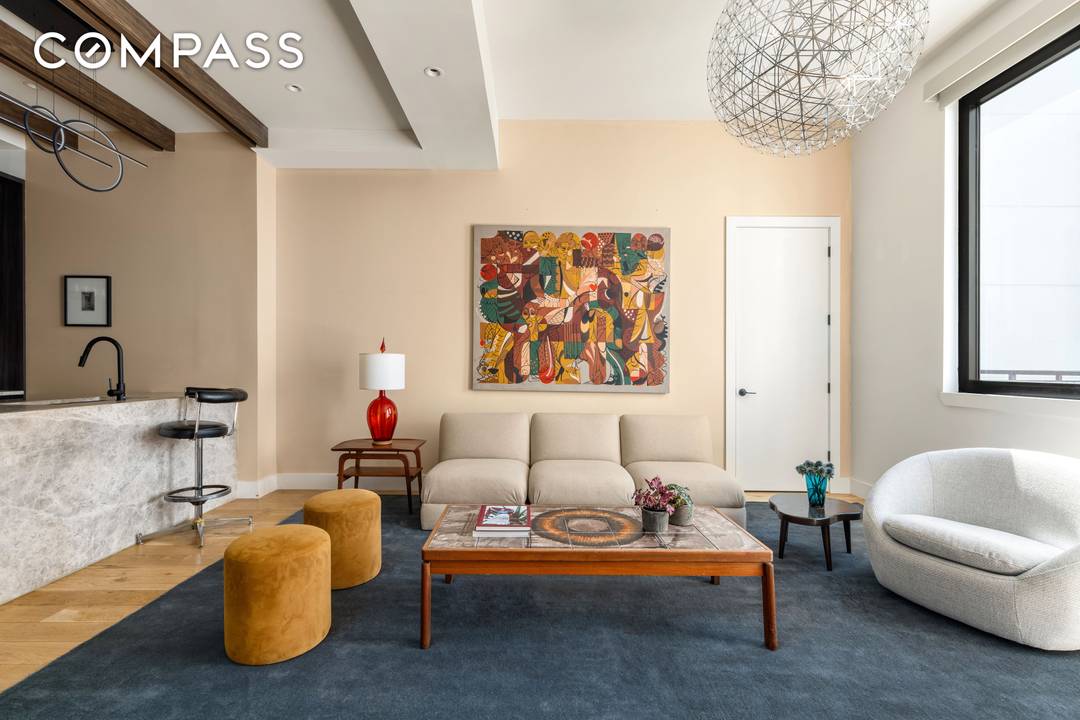 Residence 2C at The Salvation Lofts 10 Quincy Street is an oversized one bedroom, one bath home defined by scale, light, and seamless indoor outdoor living.
