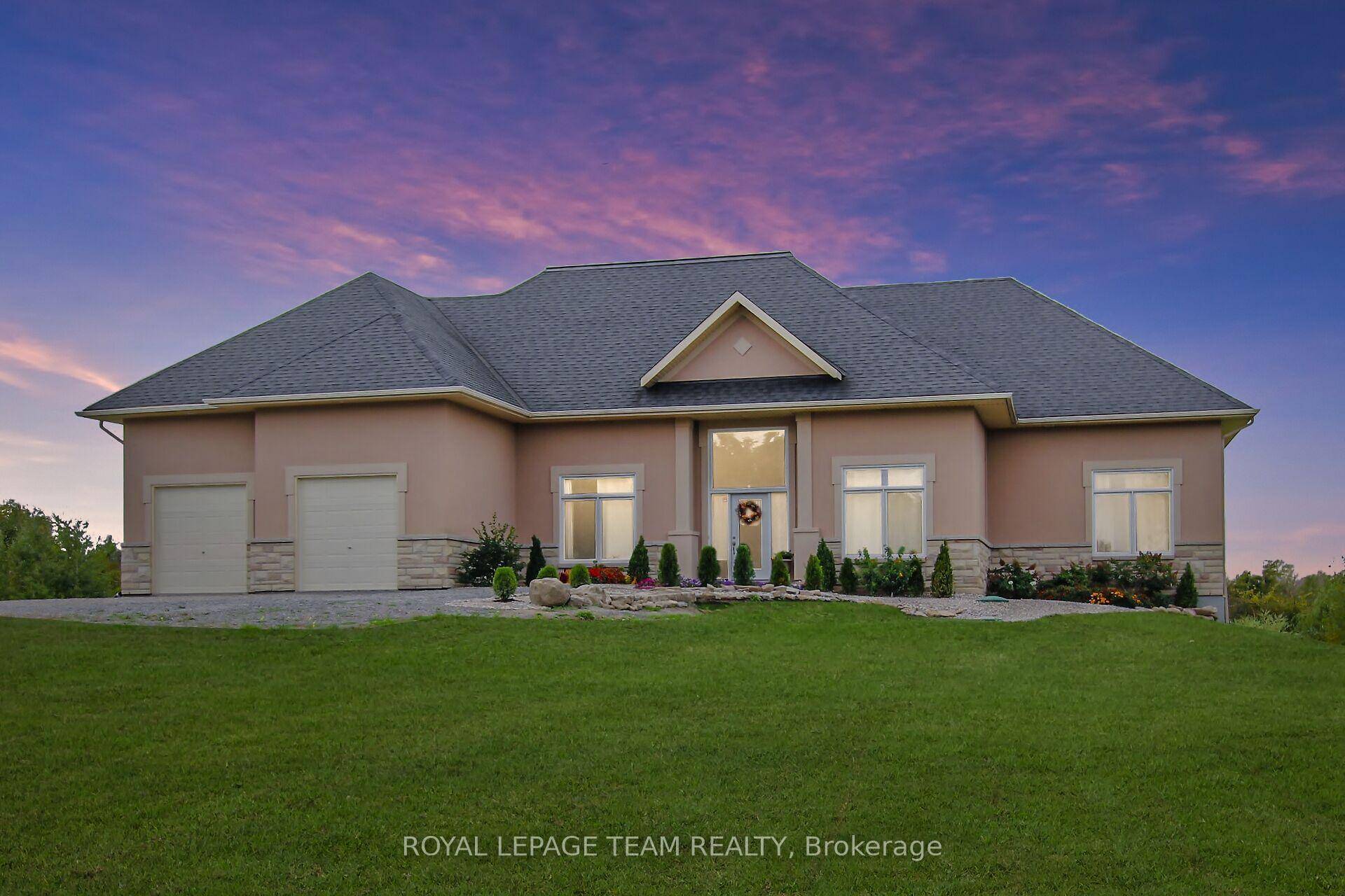 Welcome to 195 Stonewood Dr in the distinguished community of Country Lane Estates on over 1.