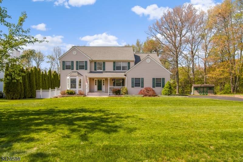 Beautifully maintained by the original owners, this sun filled 4BR, 2.