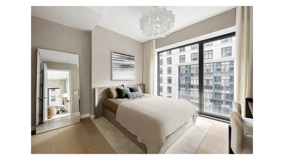 Residence 604 is a 1, 263 square foot two bedroom, two bath home with southeastern exposures defined by a great room with a double height 20 foot ceiling and 8 ...