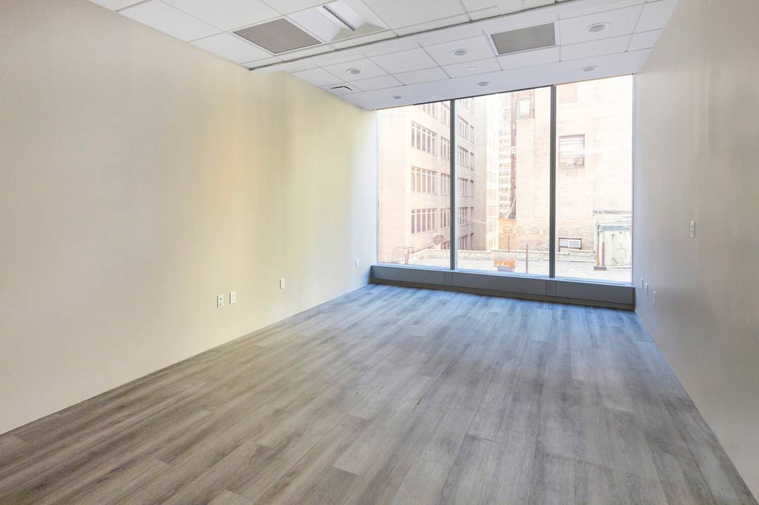 Located in the heart of Manhattan's renowned Diamond District, this exclusive office condominium at 50 West 47th Street, Suite 10U, presents an exceptional opportunity for businesses, jewelers, and investors alike.