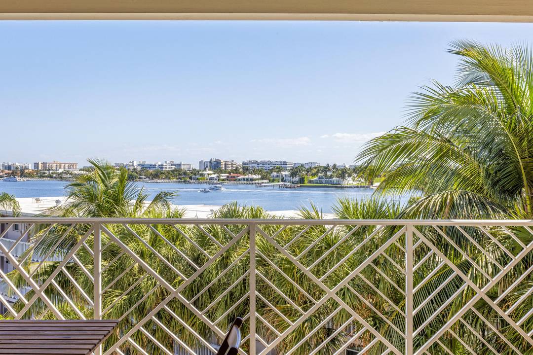 This stunning coastal condo has incredible views of the Intracoastal and city.