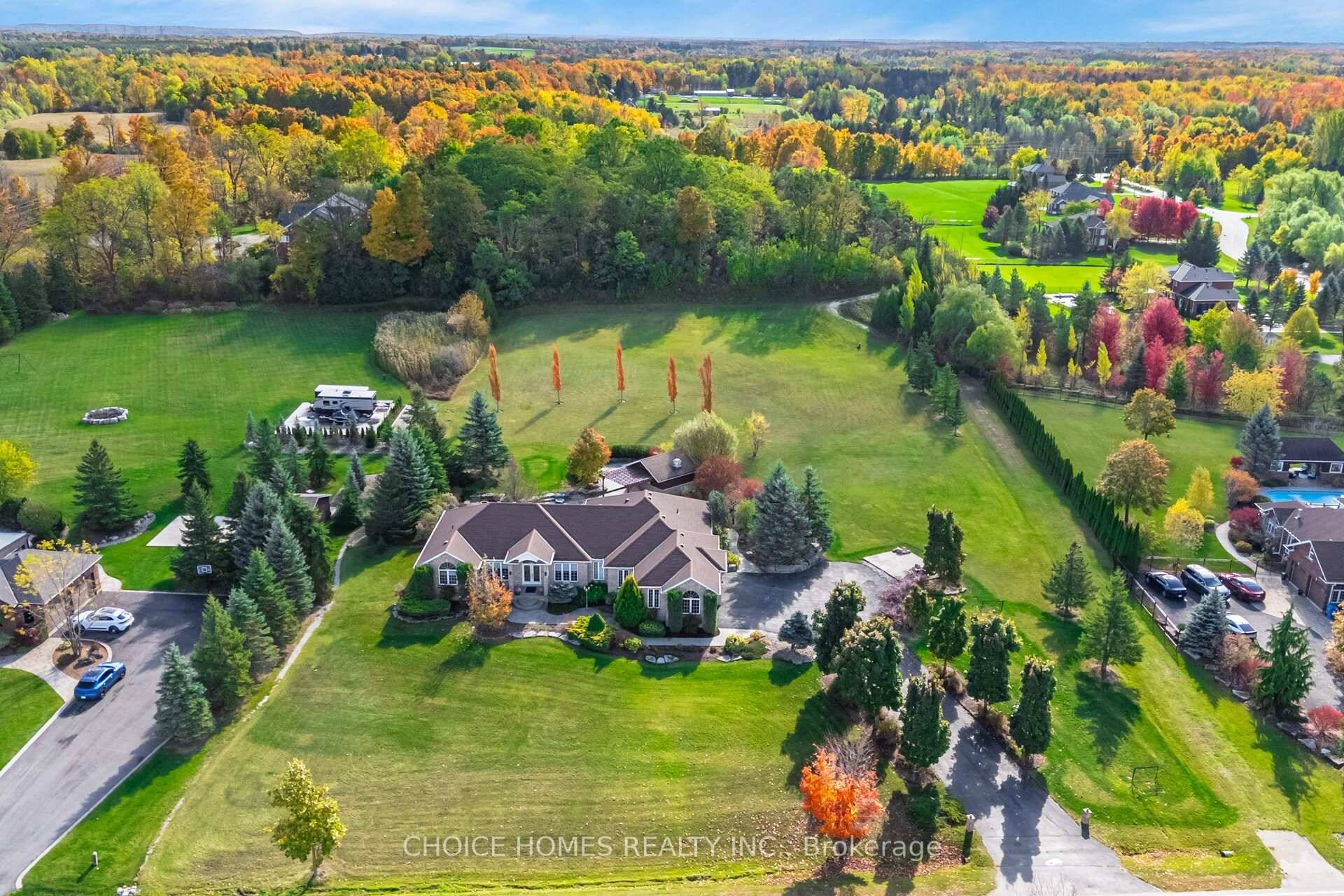 Fully Landscaped All Brick 4 2 Bedroom Bungalow with Three Car Garage On 2.