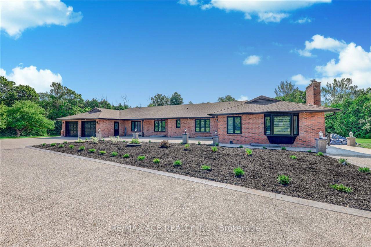 Welcome to this exquisite custom built bungalow, nestled on a sprawling 2.