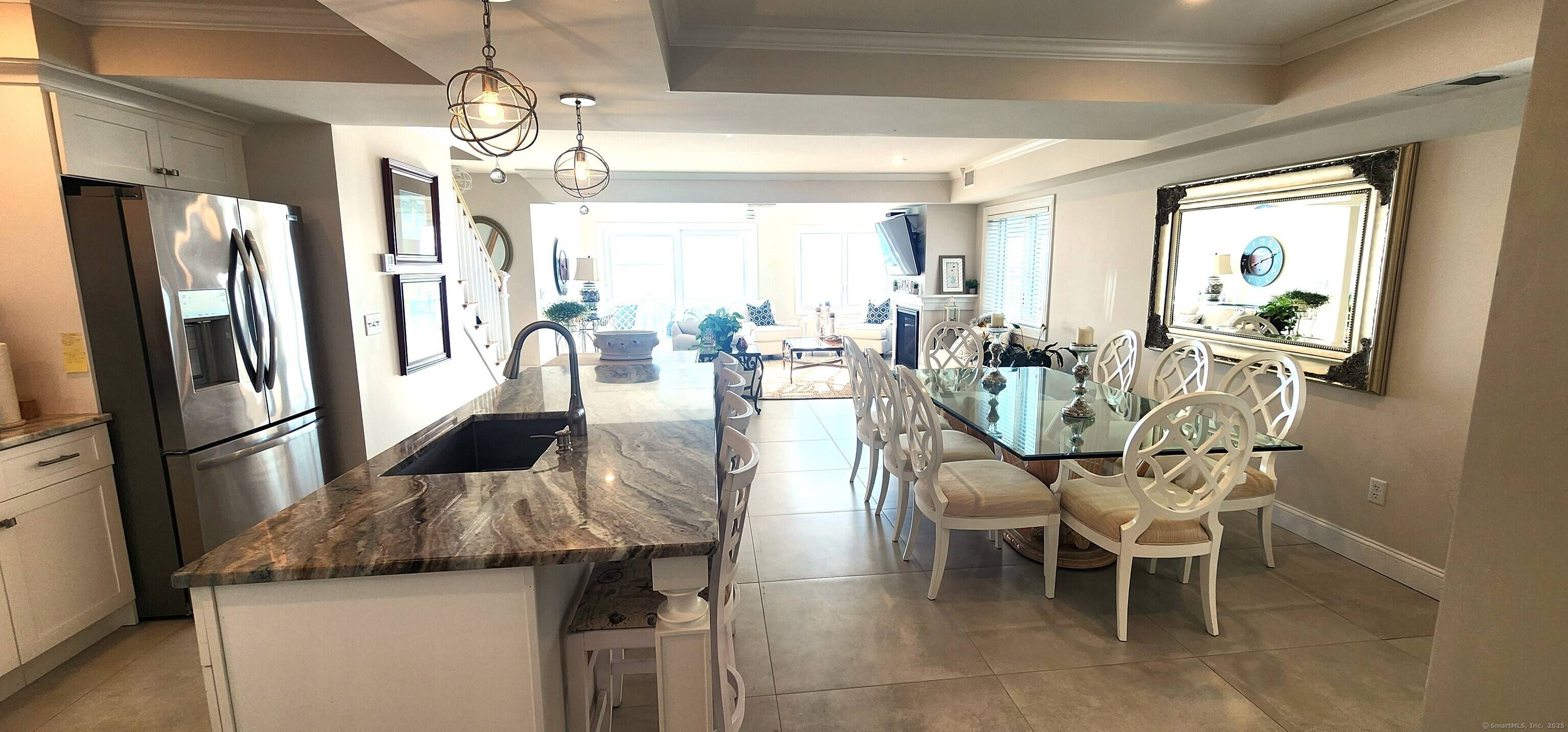 This DIRECT WATERFRONT. Spectacular Sunrise views of Long Island Sound with a fully updated interior.