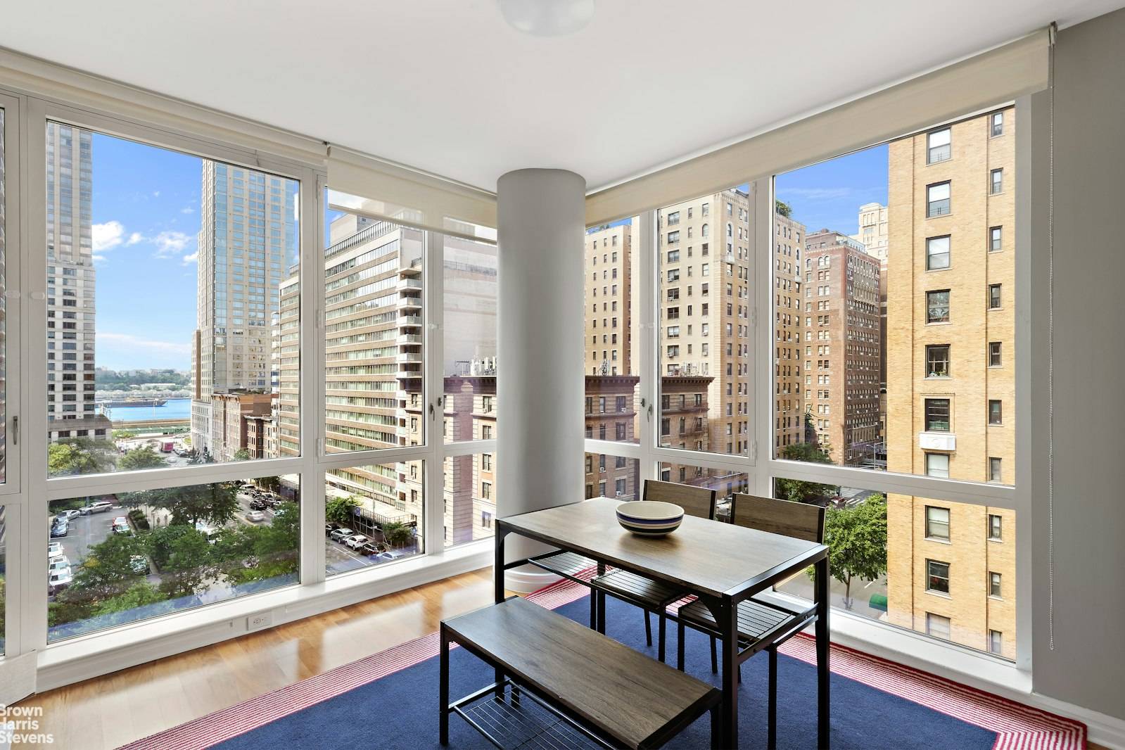 BRIGHT CORNER UNIT WITH RIVER VIEWS !