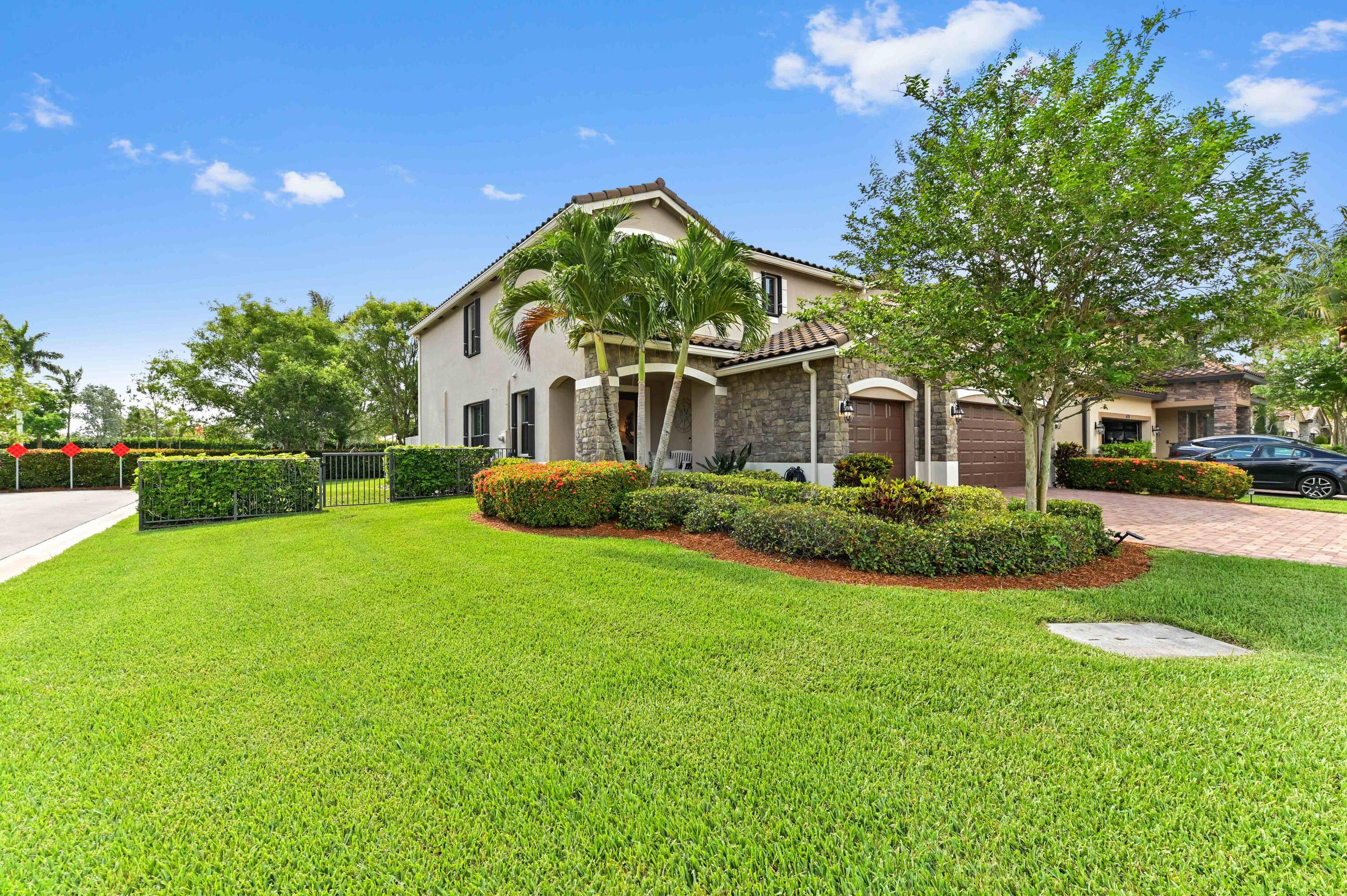 Welcome to Gulfstream Preserve, an exquisite gated community in Lake Worth, FL, where luxury meets convenience in this stunning 2 story single family home.