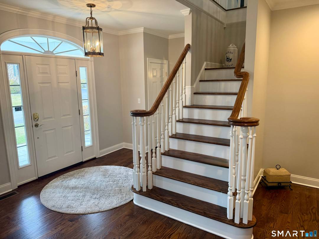 Downsize in style and enjoy luxurious, low maintenance living at The Elms, an intimate, upscale 21 home adult community set on a quiet cul de sac.